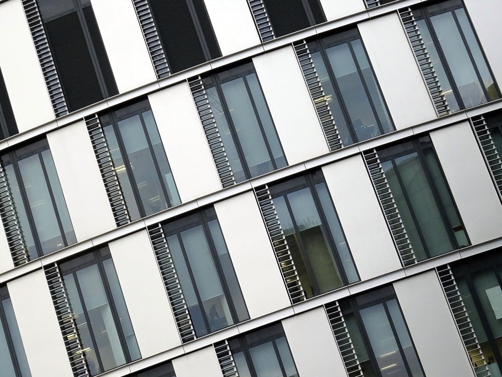Glass windows and exterior facade of a modern office building